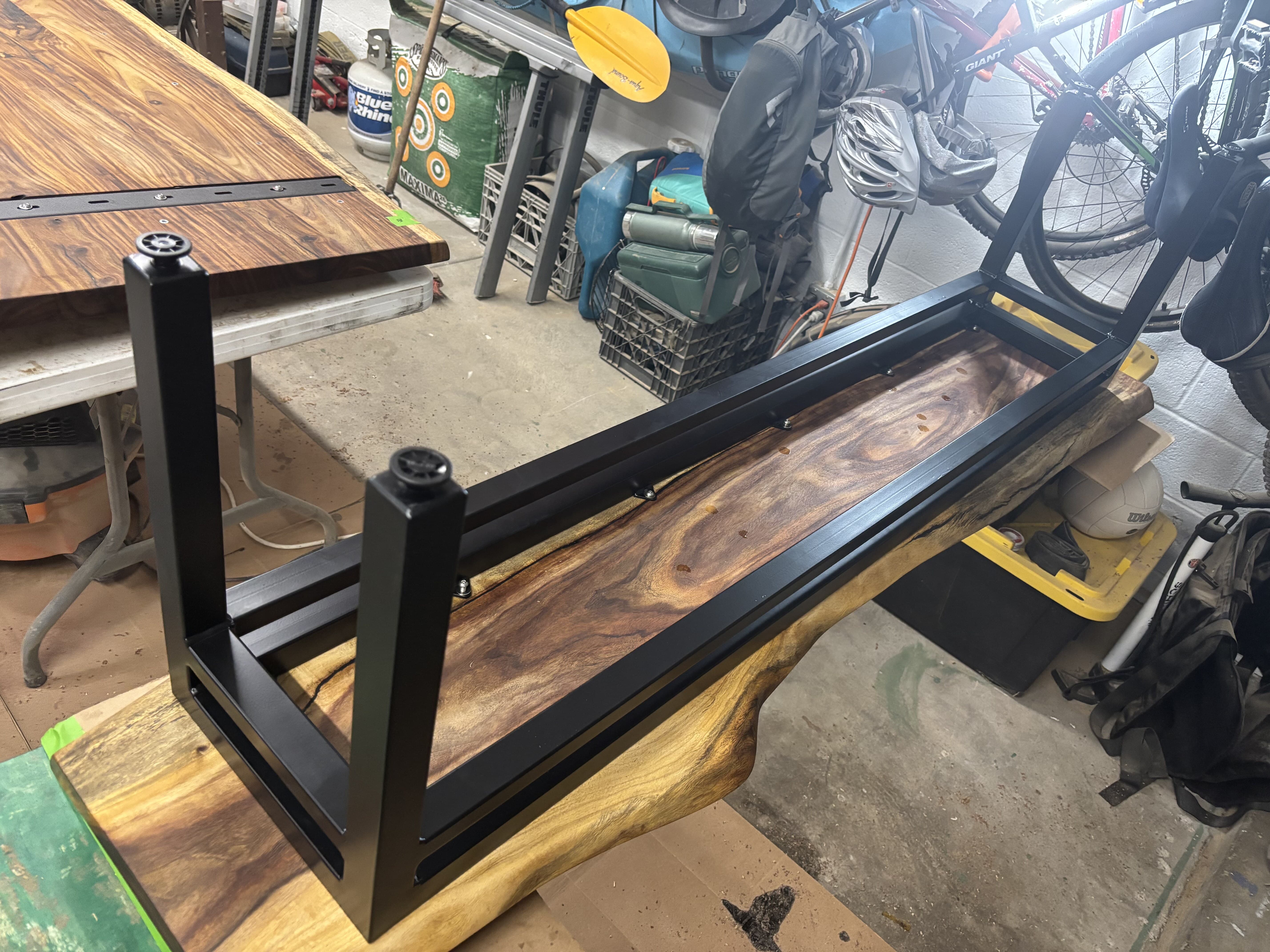 The bench's steel frame test-fit, ready for the top